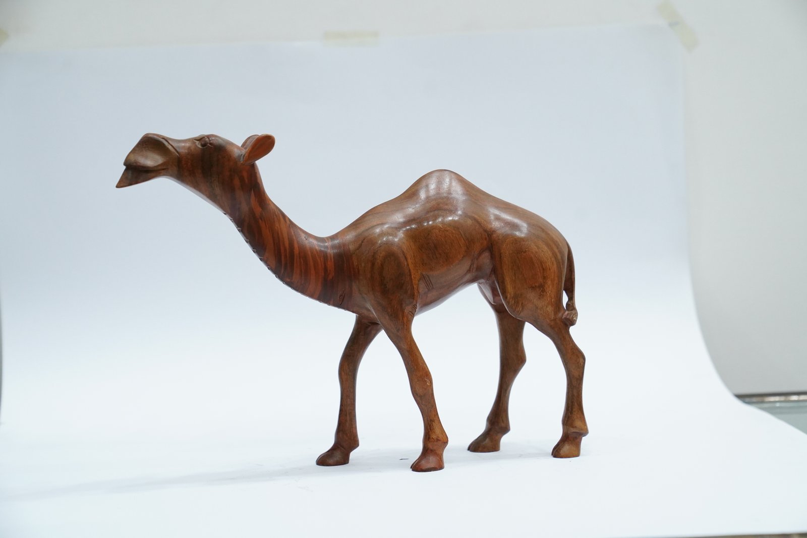 Handcrafted Wooden Camel – A Symbol of Strength and Grace